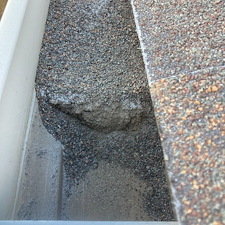 Gutter-cleaning-in-Prescott-valley-with-excessive-debris-from-deteriorating-roof-shingles-Even-treeless-lots-gutters-need-cleaning 3